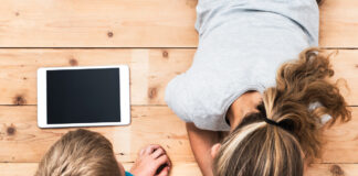 Kids playing with mobile devices