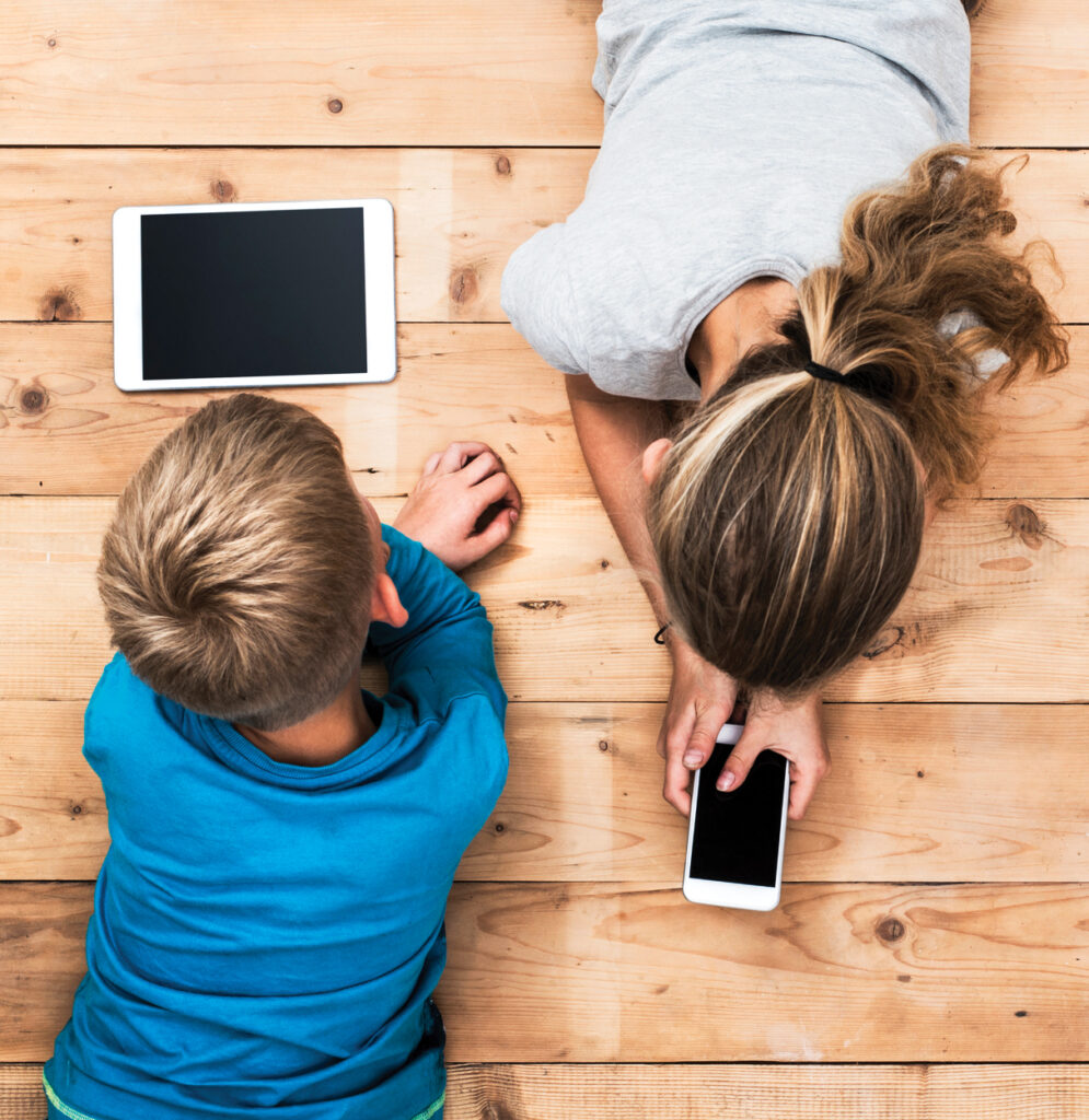 Kids playing with mobile devices