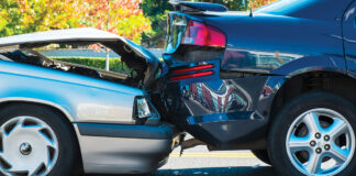 Auto accident involving two cars on a city street