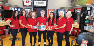 Sports Clips team members (left to right) Katrina, Lauren, Sami, Jessica, Kiana, Sherry and Team Leader Mitzi Henley