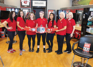 Sports Clips team members (left to right) Katrina, Lauren, Sami, Jessica, Kiana, Sherry and Team Leader Mitzi Henley