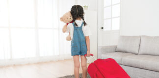 Child with suitcase